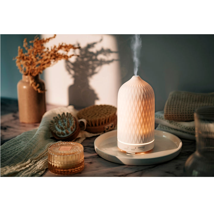 Camry CR 7970 Ultraschall-Aromadiffusor 3in1, 3 Funktionen: Aromatherapie, Schonende Befeuchtung, Stimmungslampen,Ultraschallfrequenz: 2,4MHz, Fassungsvermögen: 100ml, Befeuchtungsleistung: 20-30ml/h